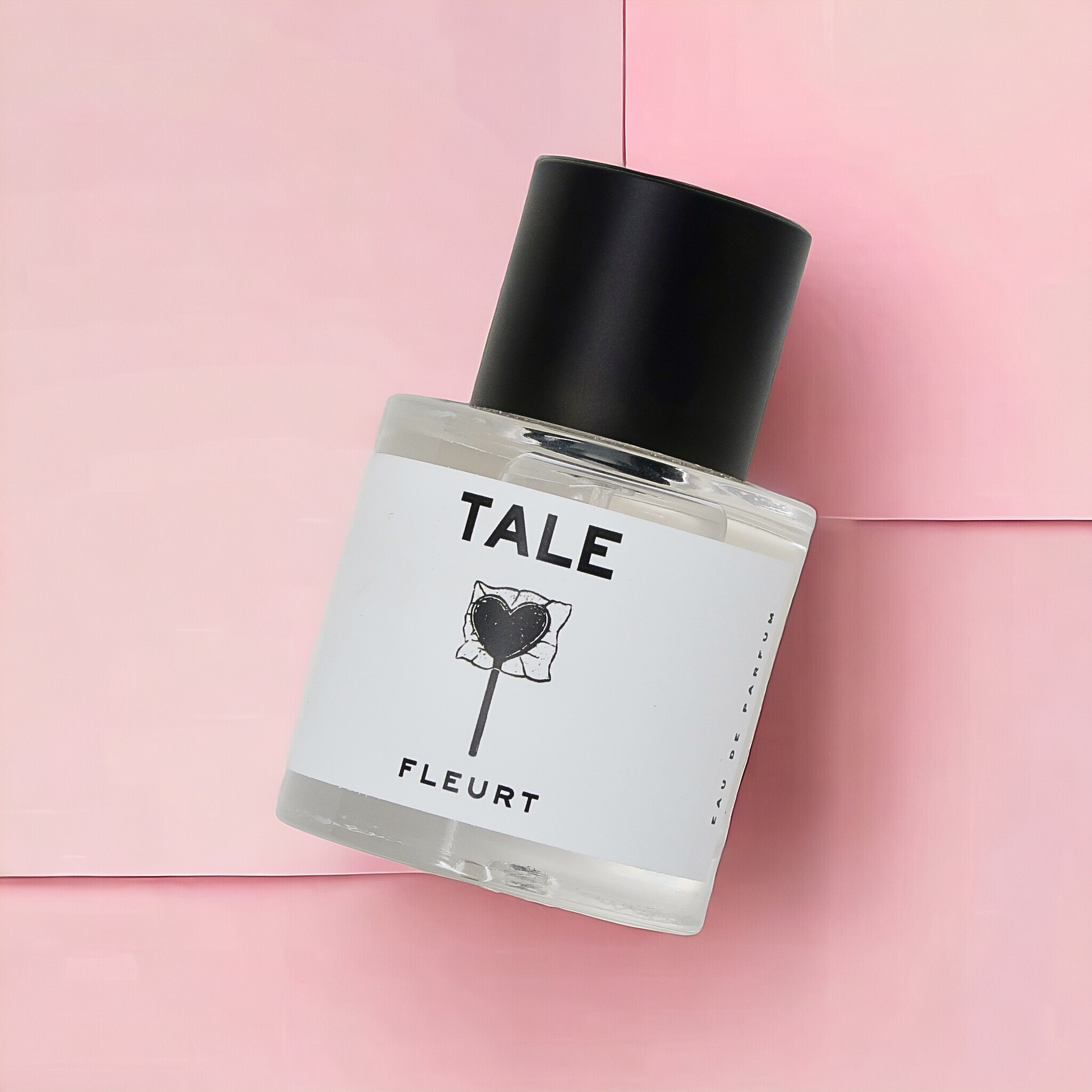 Fleurt 50ML Bottle on Pink Paper Background
